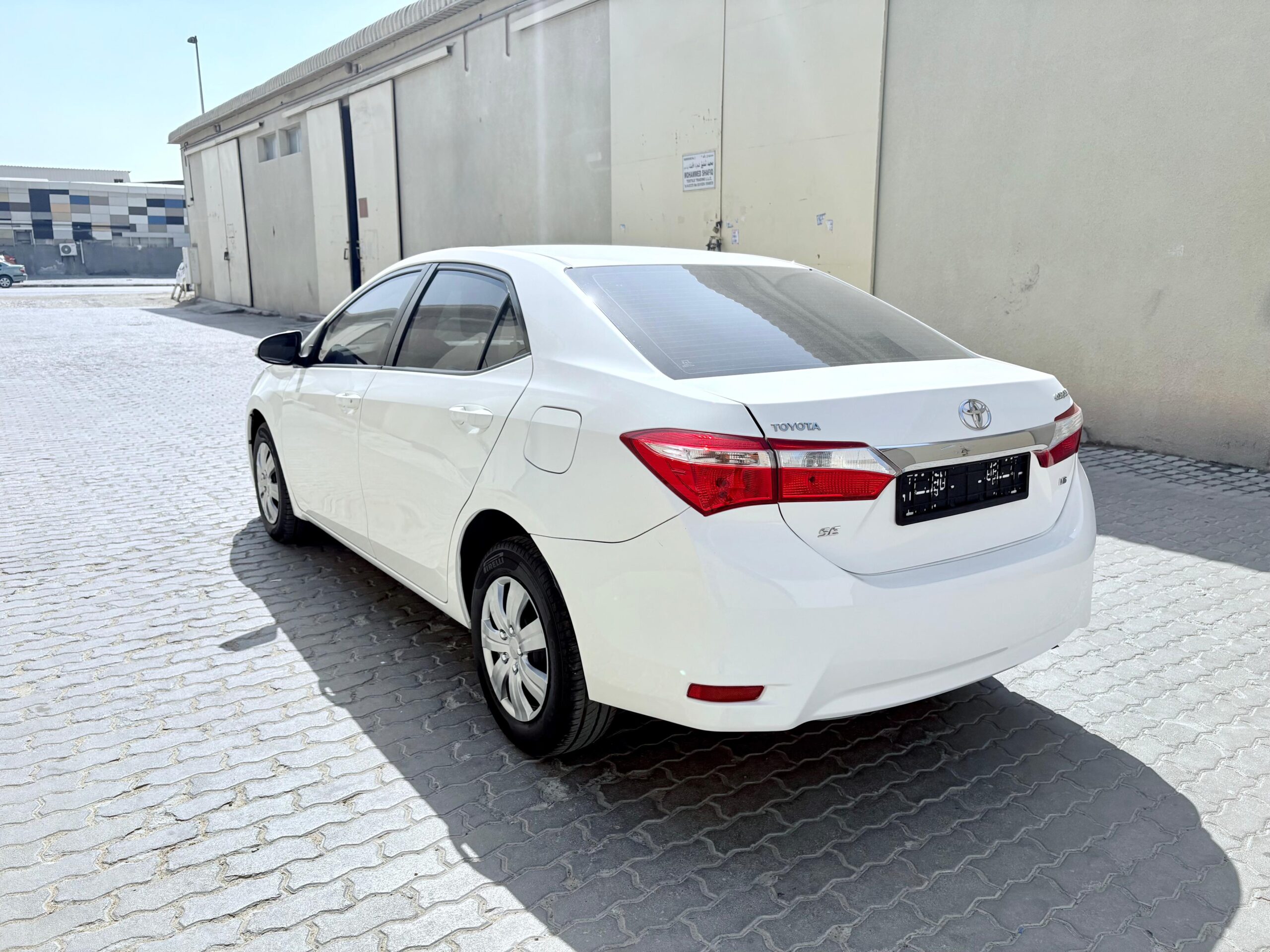 toyota-corolla-2015-left-side-rear-angle