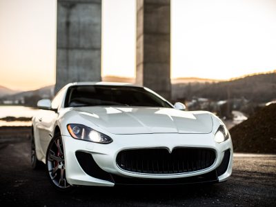 white-coupe-sport-car-standing-road-front-view